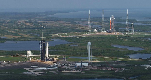 SLS and Falcon 9 in View on the Launch Pads